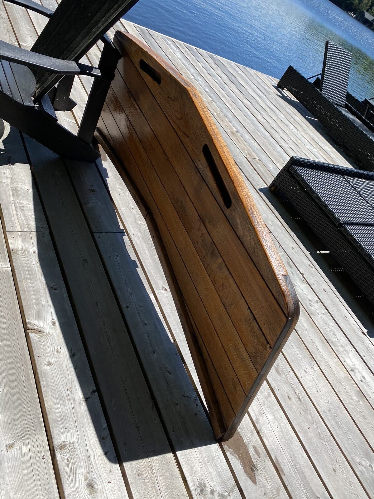 Teak swim platform freshly oiled on a Muskoka dock