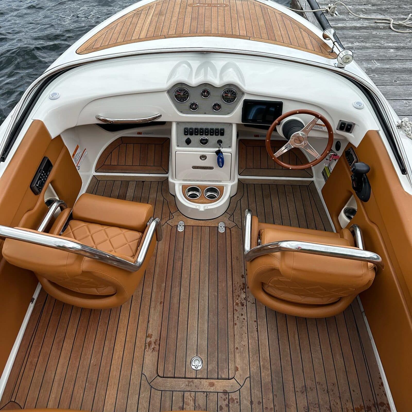 Premium classic boat interior with caramel leather and teak deck
